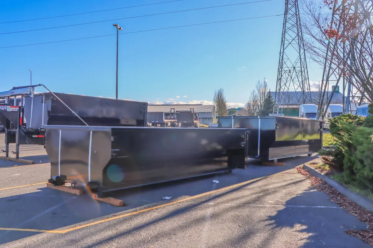 Roll-off dumpster ready for waste disposal at job site for Construction Dumpster Rental in Layton